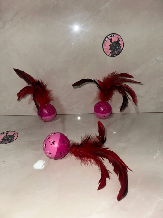 Bolita con pluma